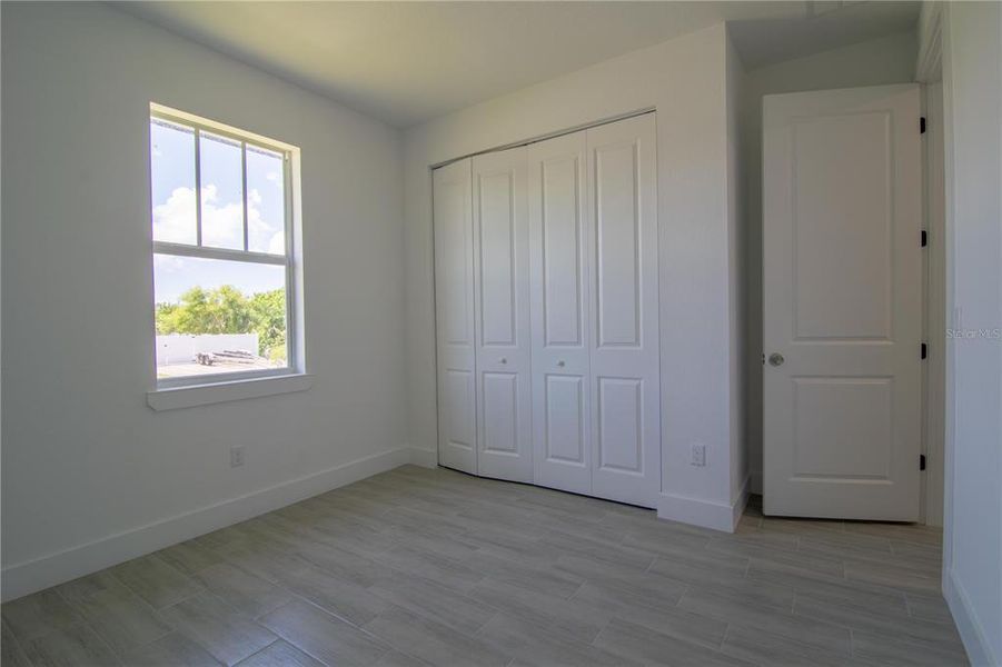 Spacious, unfurnished interior of a new home in , Port Charlotte (Image 9).