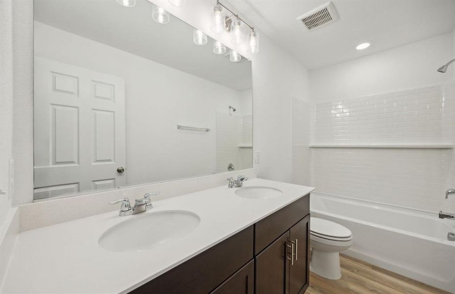 Upgraded secondary bathroom*real home pictured