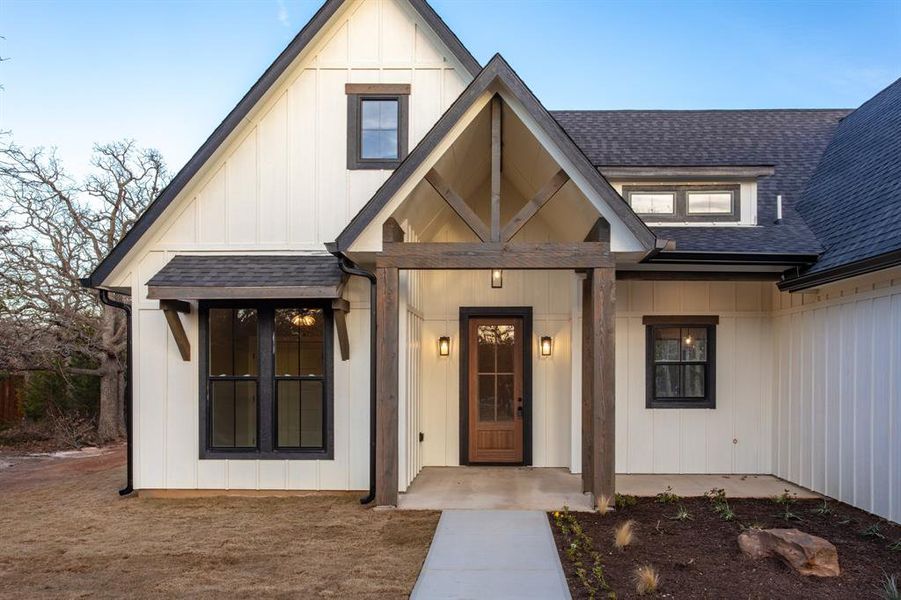 The wood accents are stunning in this farmhouse hideaway on an acre lot!