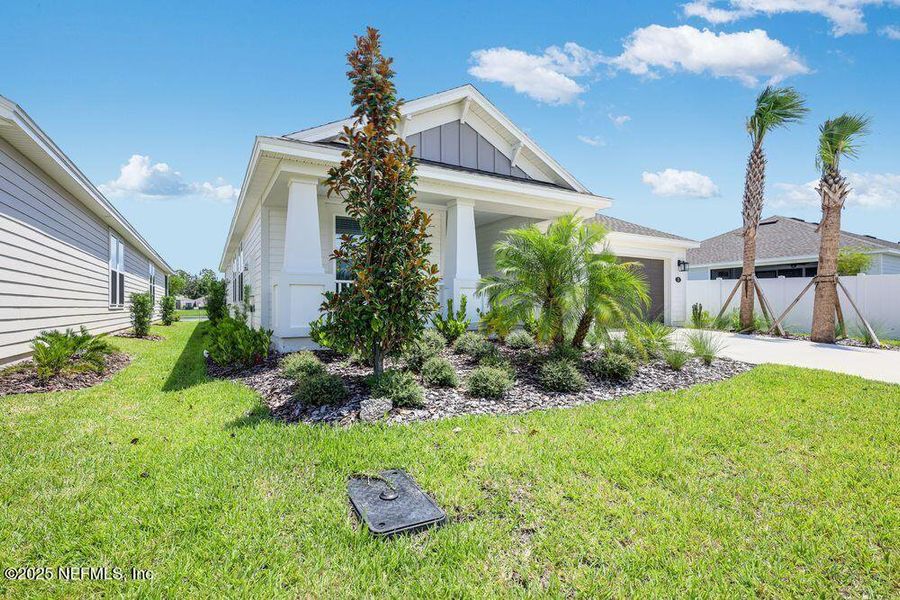 Front exterior of a new home in Colbert Landings, Palm Coast, FL, highlighting curb appeal (Image 19).