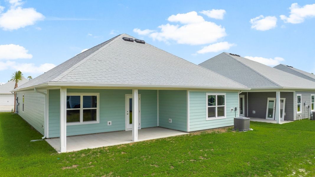 Exterior details and patio area of a home in WindMark Beach, Port Saint Joe (Image 3).
