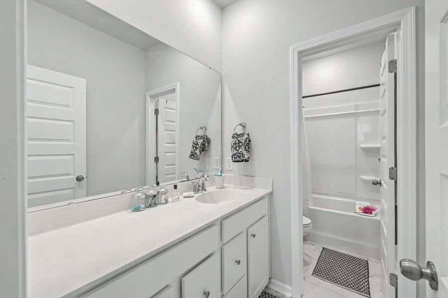 Furnished interior view inside a new home in Limehouse Village: Row Collection, Summerville (Image 19).