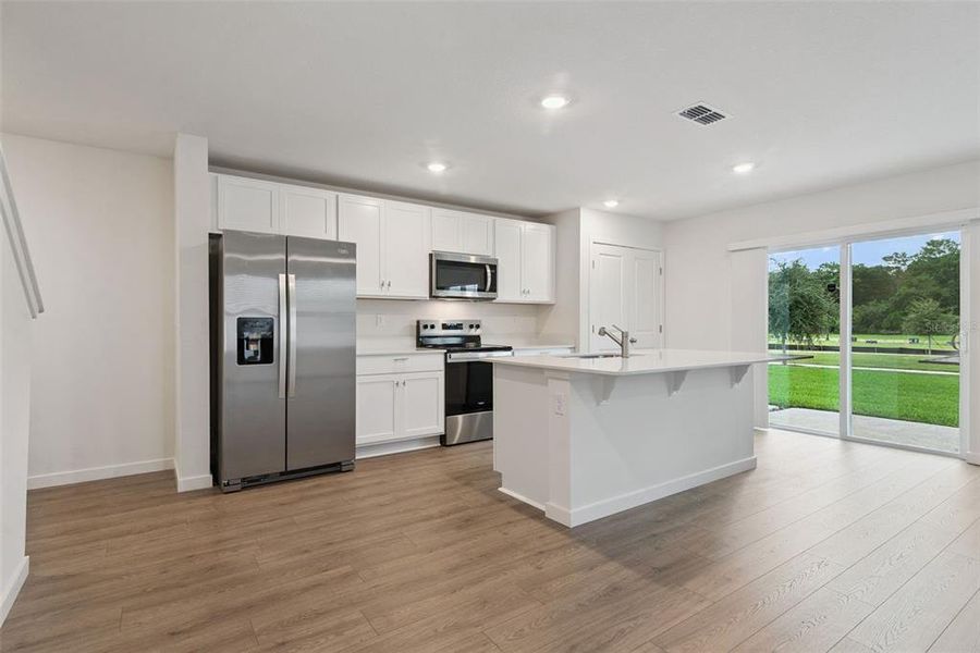 Furnished interior view inside a new home in Vineland Reserve, Osteen (Image 4).