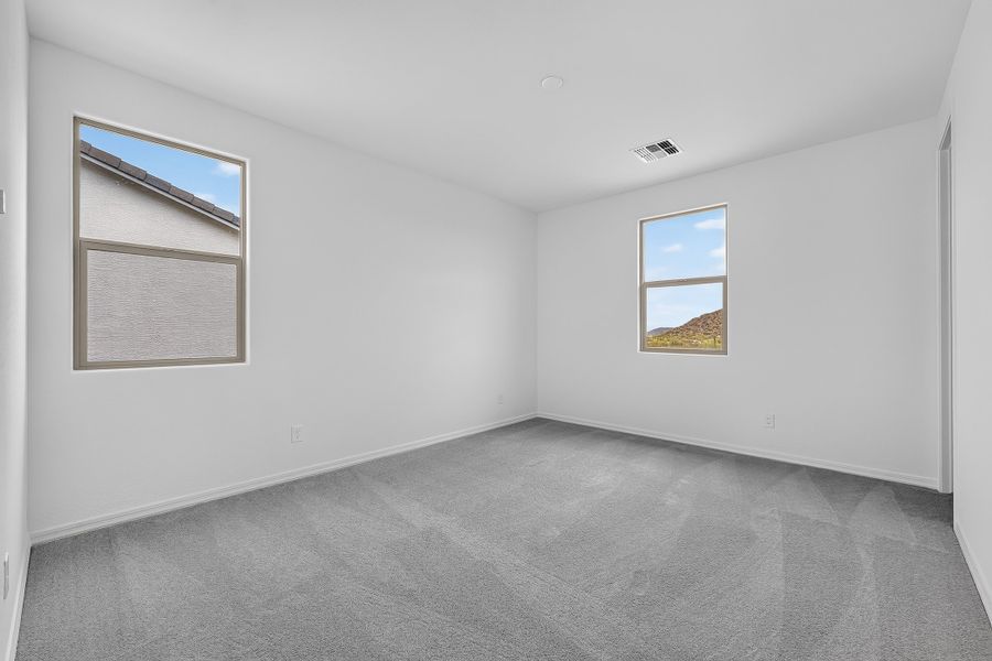 Spacious, unfurnished interior of a new home in Ladera Trails, Queen Creek (Image 21).
