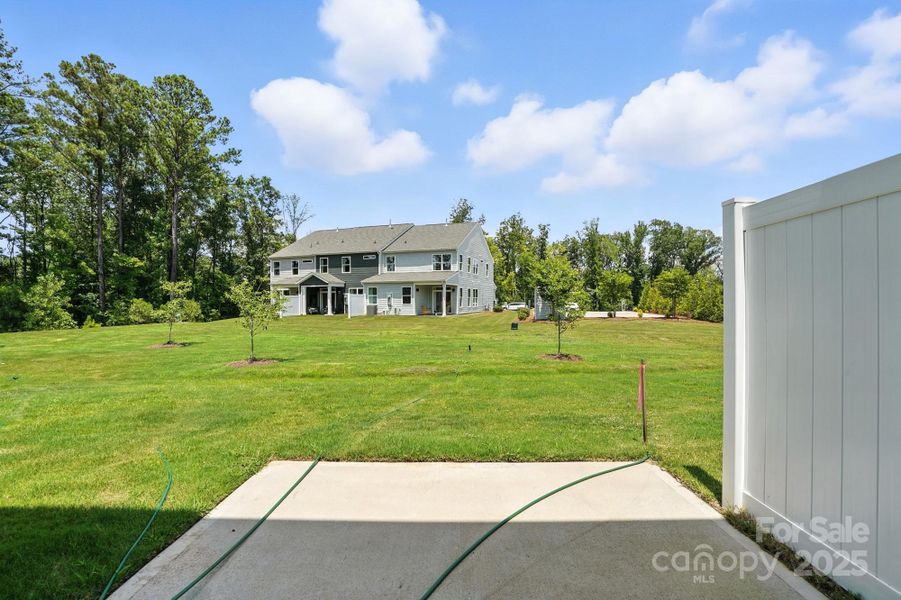 Front exterior of a new home in Harrisburg Village Townhomes, Harrisburg, NC, highlighting curb appeal (Image 2).