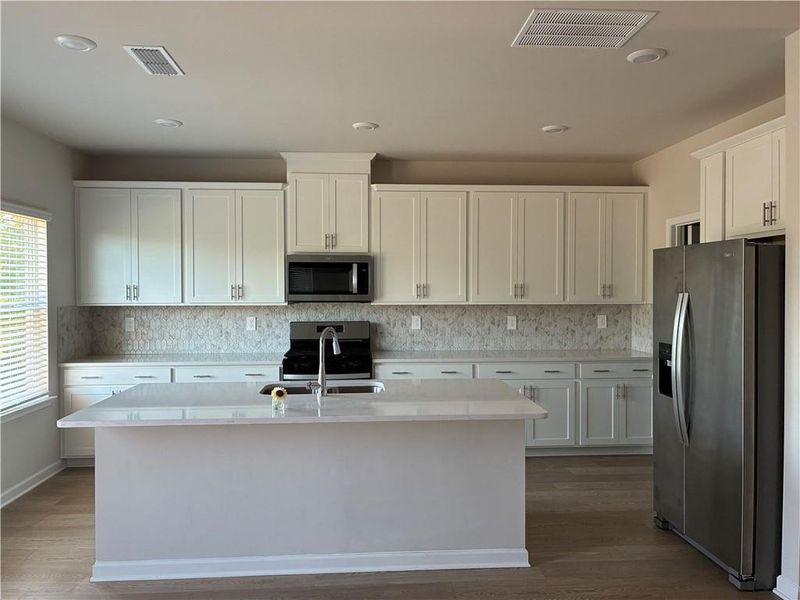 Furnished interior view inside a new home in Hamilton Crossing, Buford (Image 4).
