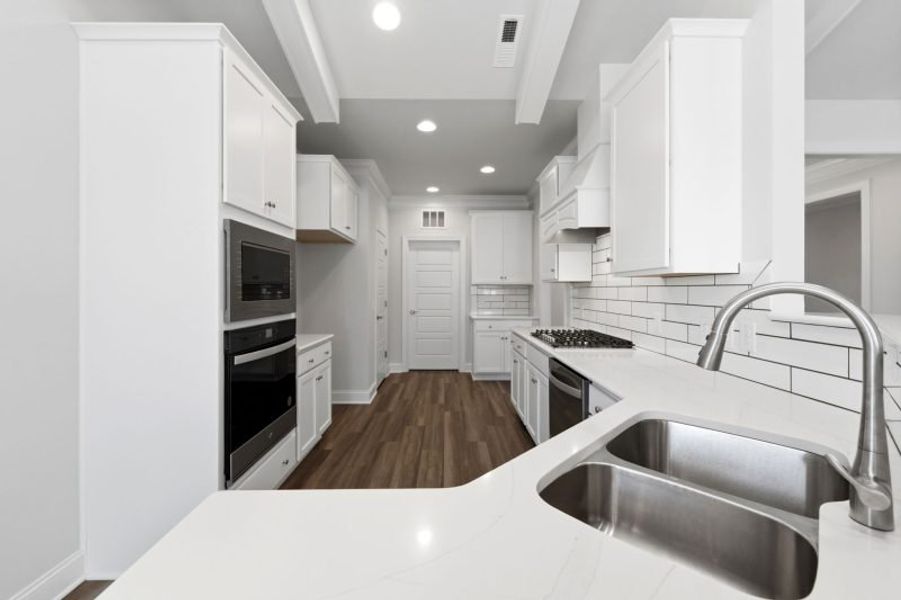 Furnished interior view inside a new home in Weybridge, Burlington (Image 7).