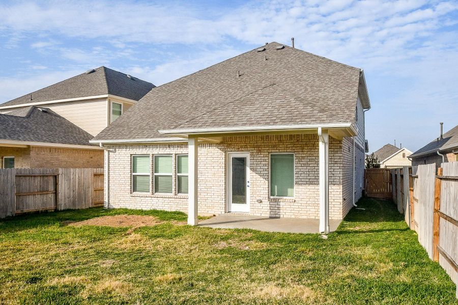 Exterior details and patio area of a home in Marvida, Cypress (Image 21).