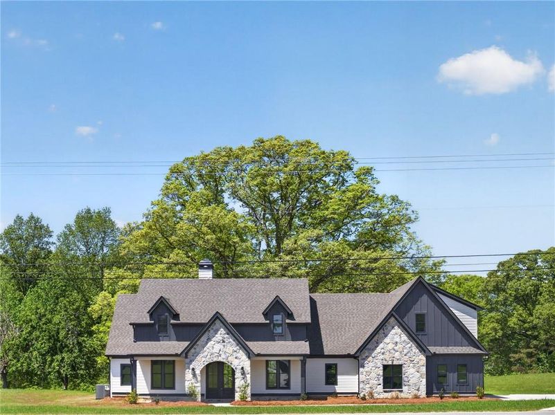 Front exterior of a new home in The Meadows at Lake Circle, Buchanan, GA, highlighting curb appeal (Image 26).
