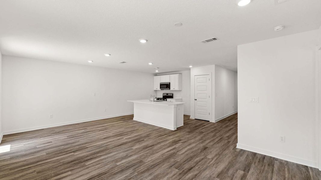 Spacious, unfurnished interior of a new home in Magnolia at the Bluffs Phase 3, Freeport (Image 15).