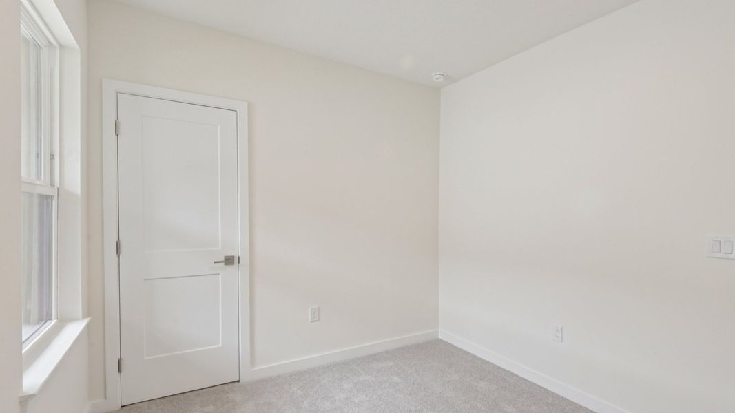 Furnished interior view inside a new home in Grasslands West, Lakeland (Image 32).