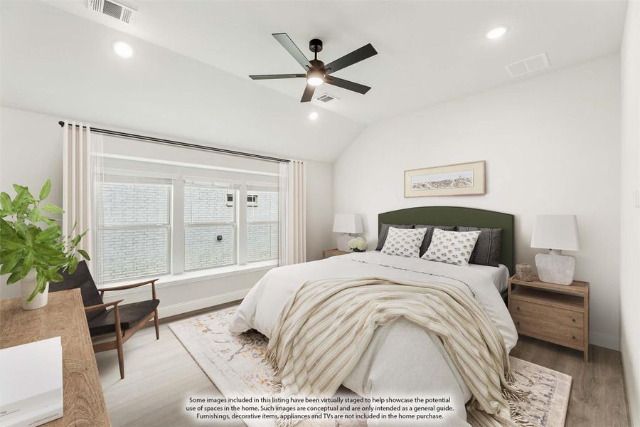Bedroom with vaulted ceiling, ceiling fan, large window, and hardwood floors Bedroom with vaulted ceiling, ceiling fan, large window, and hardwood floors