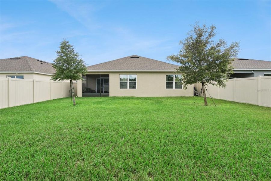 Exterior details and patio area of a home in Windrose, Apopka (Image 21).