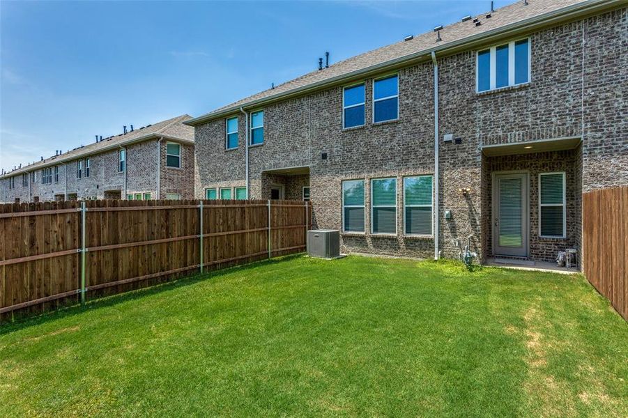 Front exterior of a new home in , Lewisville, TX, highlighting curb appeal (Image 22).