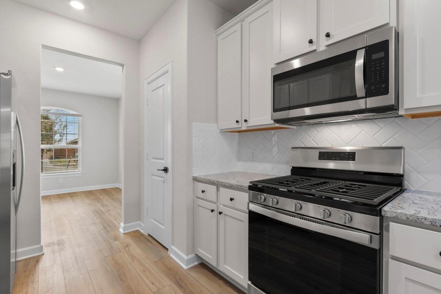 Furnished interior view inside a new home in Emberly, Beasley (Image 6).
