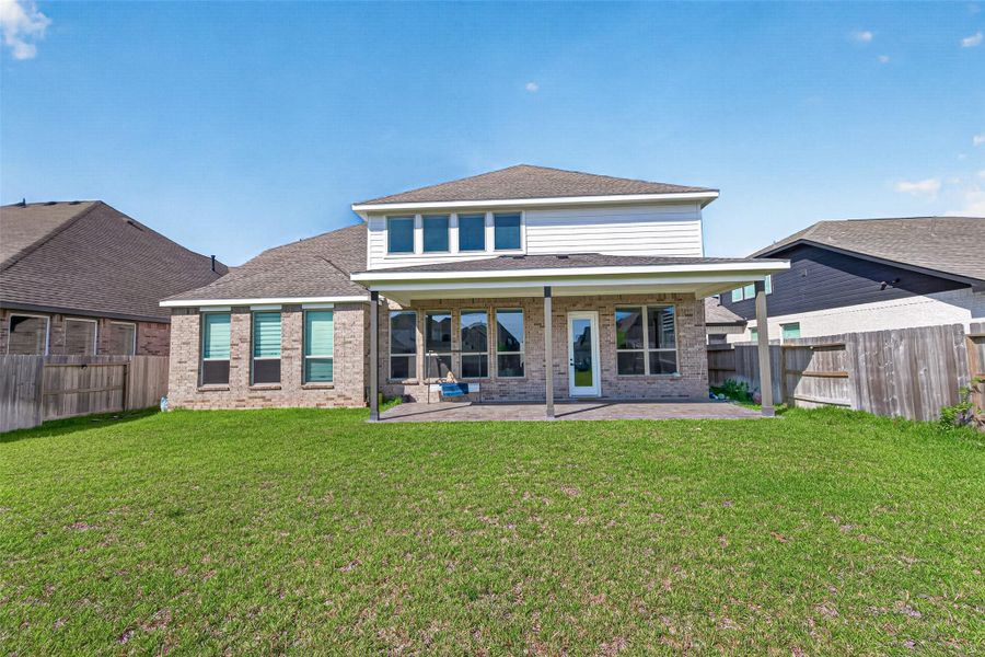 Exterior details and patio area of a home in , Katy (Image 23).