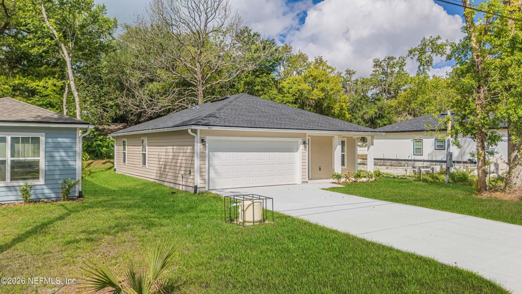 Front exterior of a new home in , Jacksonville, FL, highlighting curb appeal (Image 17). Front exterior of a new home in , Jacksonville, FL, highlighting curb appeal (Image 17).