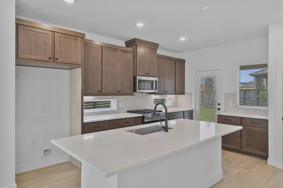 Furnished interior view inside a new home in Bridgeland Courtyard, Cypress (Image 6).
