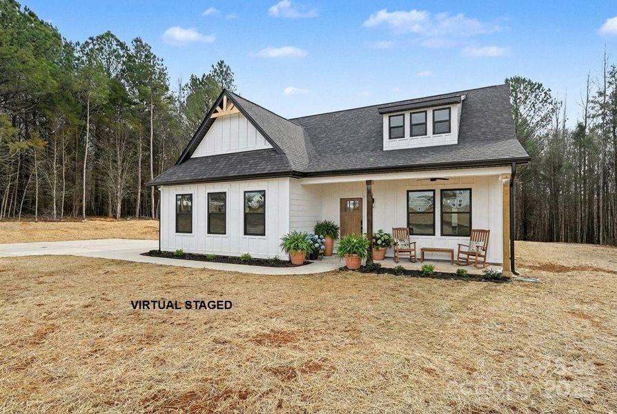 Covered front porch, perfect for soaking in the nature views Covered front porch, perfect for soaking in the nature views
