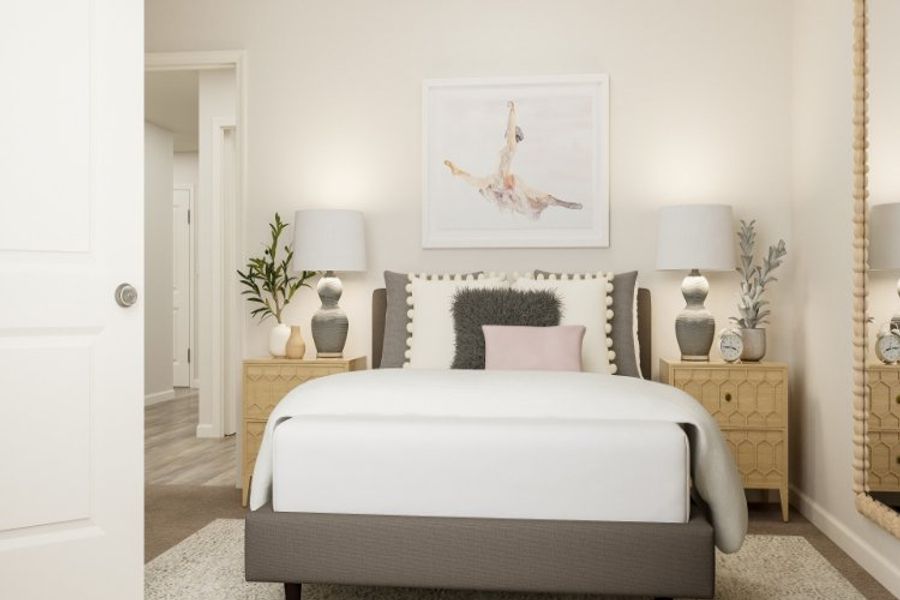 A bedroom with a bed and lamps. A bedroom with a bed and lamps.