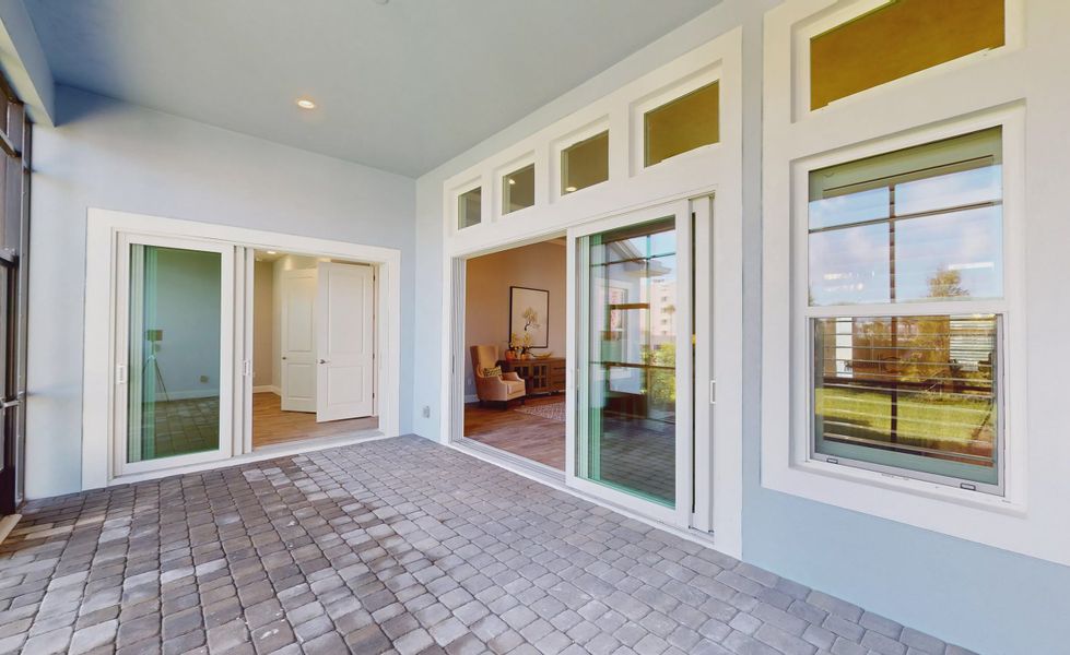 Exterior details and patio area of a home in Verona Oceanside, Ormond Beach (Image 27).