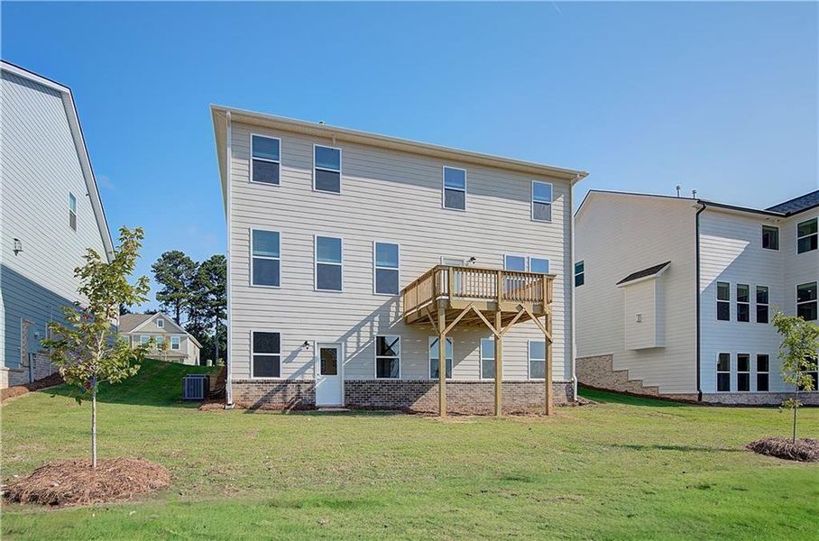 Front exterior of a new home in Cooper Park, McDonough, GA, highlighting curb appeal (Image 14).
