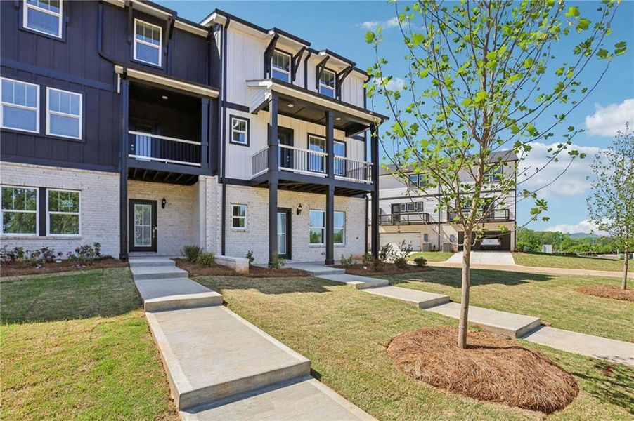 Front exterior of a new home in Hemingway - Highland Series, Cumming, GA, highlighting curb appeal (Image 26).