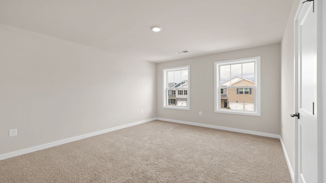Spacious, unfurnished interior of a new home in Adams Glen, Greenville (Image 25).