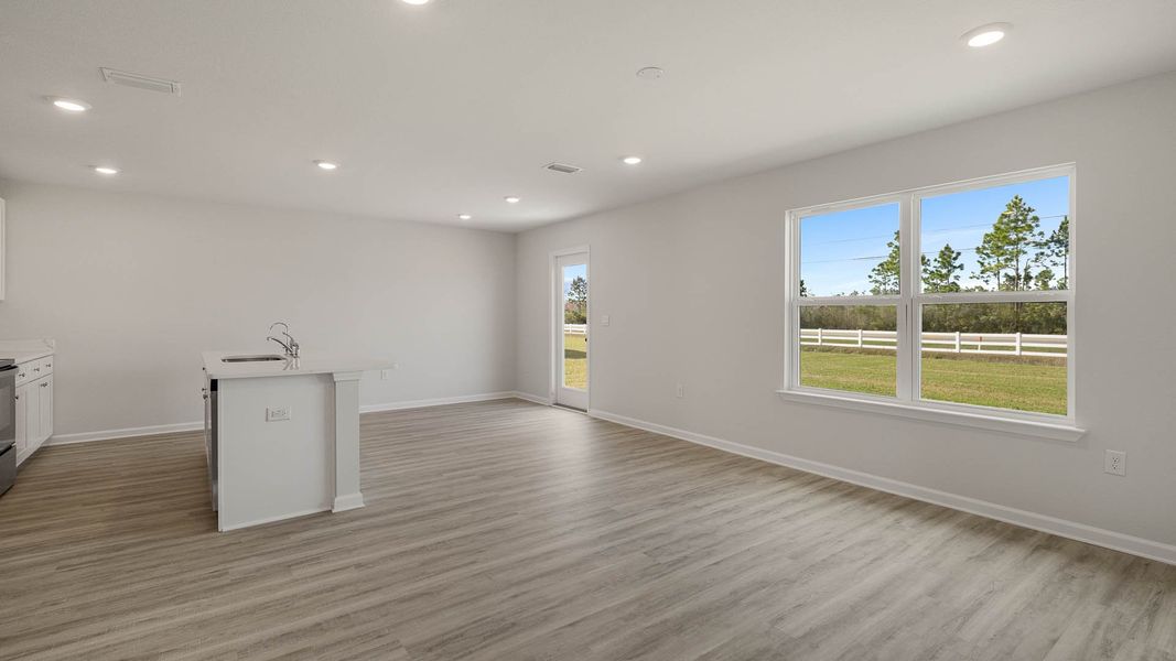 Spacious, unfurnished interior of a new home in Magnolia at the Bluffs Phase 3, Freeport (Image 12).