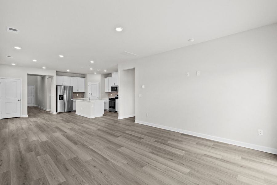 Spacious, unfurnished interior of a new home in Cypress Ridge - The Boardwalk Series, Longs (Image 19).