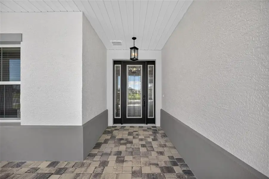 Exterior details and patio area of a home in , Ocala (Image 28).