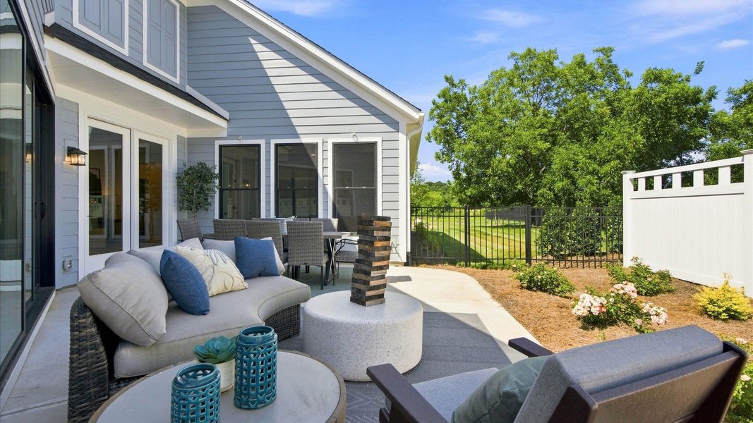 Exterior details and patio area of a home in The Courtyards at Hodges Farm, Charlotte (Image 23).