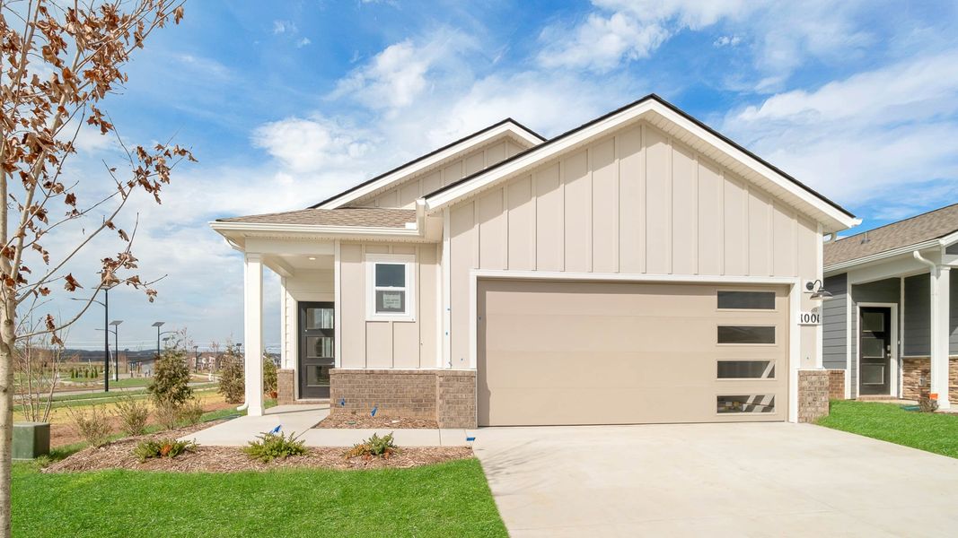 Front exterior of a new home in Nexus South, Gallatin, TN, highlighting curb appeal (Image 1). Front exterior of a new home in Nexus South, Gallatin, TN, highlighting curb appeal (Image 1).