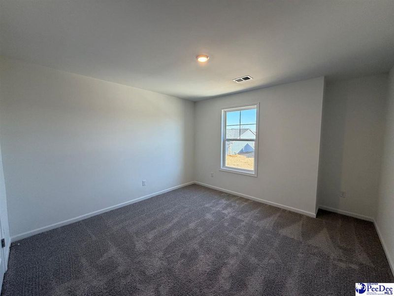 Spacious, unfurnished interior of a new home in The Grove, Florence (Image 31).