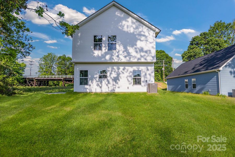 Front exterior of a new home in , Statesville, NC, highlighting curb appeal (Image 15).