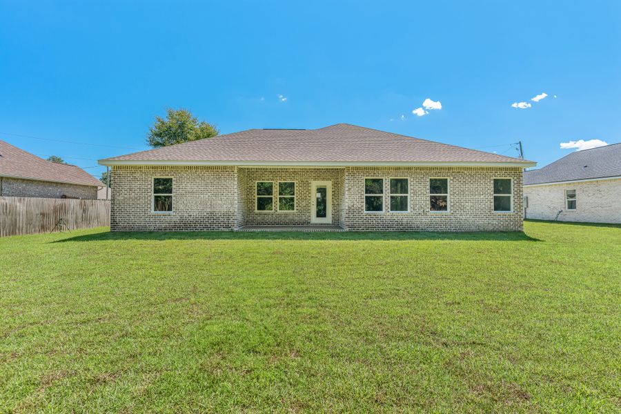 Exterior details and patio area of a home in Southern Day Chateau, Baker (Image 21).