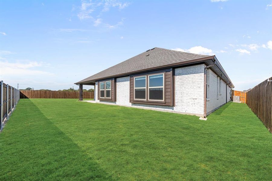 Exterior details and patio area of a home in East Oak Creek 50-55, Commerce (Image 4). Exterior details and patio area of a home in East Oak Creek 50-55, Commerce (Image 4).