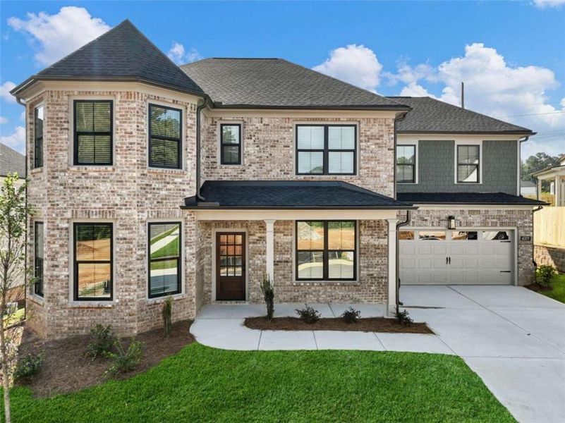 Front exterior of a new home in , Buford, GA, highlighting curb appeal (Image 1). Front exterior of a new home in , Buford, GA, highlighting curb appeal (Image 1).