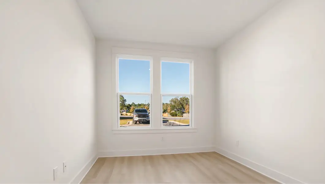 Representative unfurnished interior of a home built from the Ava by D.R. Horton in Parkside, Santa Rosa Beach (Image 12).