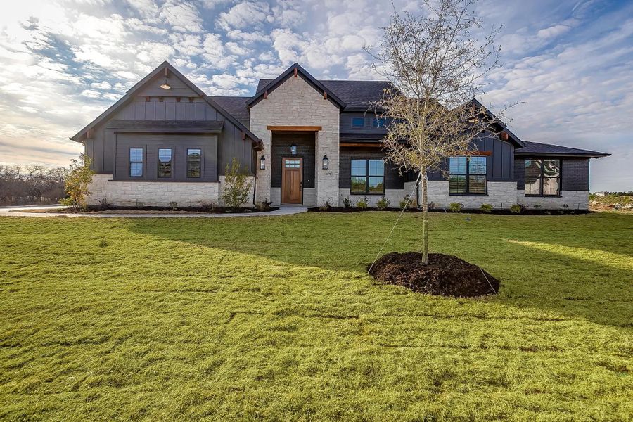 Representative exterior photo of a completed home built from the The Luke by Elmwood Custom Homes in Matthews Farm, Venus, TX (Image 2). Representative exterior photo of a completed home built from the The Luke by Elmwood Custom Homes in Matthews Farm, Venus, TX (Image 2).