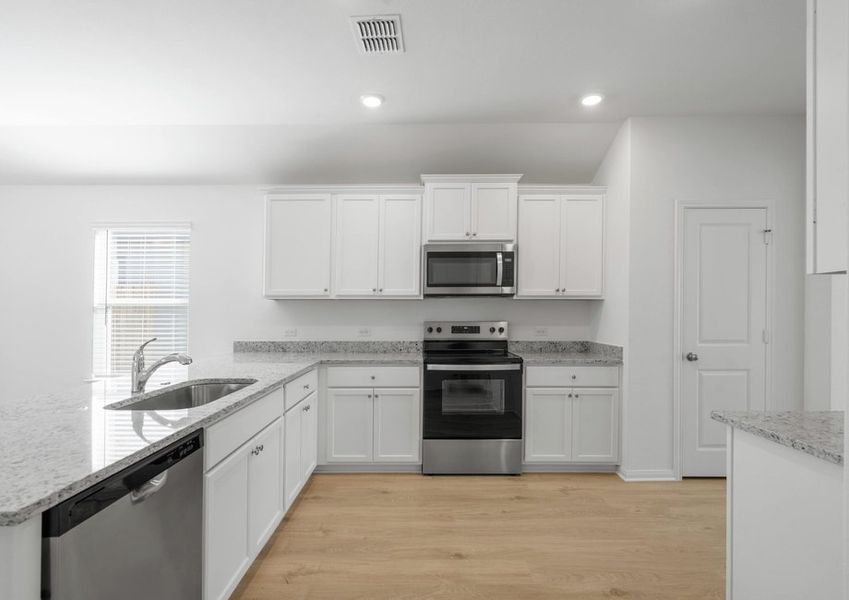 Kitchen with stainless steel applainces