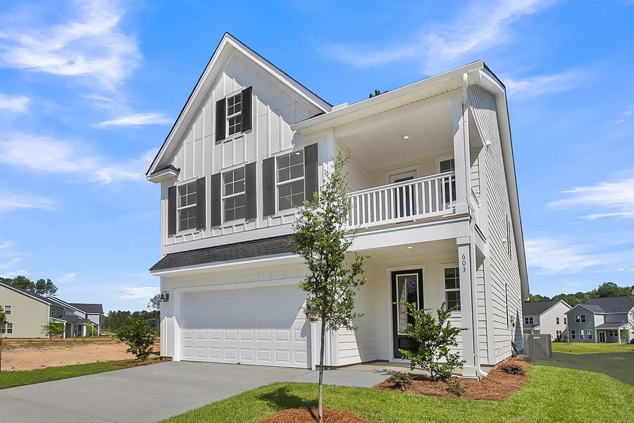 Front exterior of a new home in Pineland Preserve, Summerville, SC, highlighting curb appeal (Image 22). Front exterior of a new home in Pineland Preserve, Summerville, SC, highlighting curb appeal (Image 22).