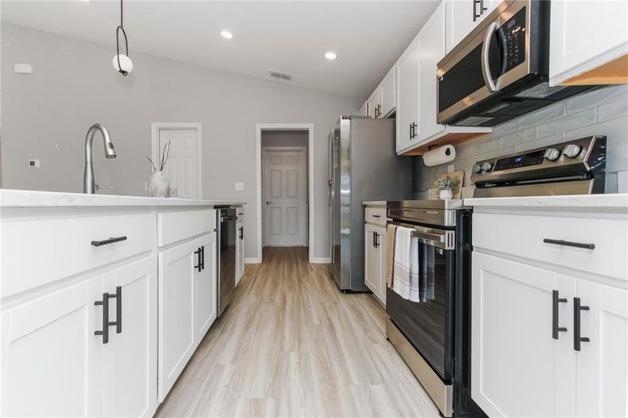 Furnished interior view inside a new home in , Zephyrhills (Image 7).
