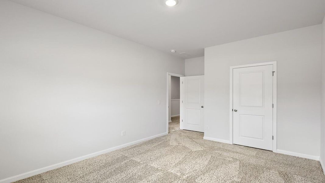 Spacious, unfurnished interior of a new home in The Crossing at St. James, Summerville (Image 25).