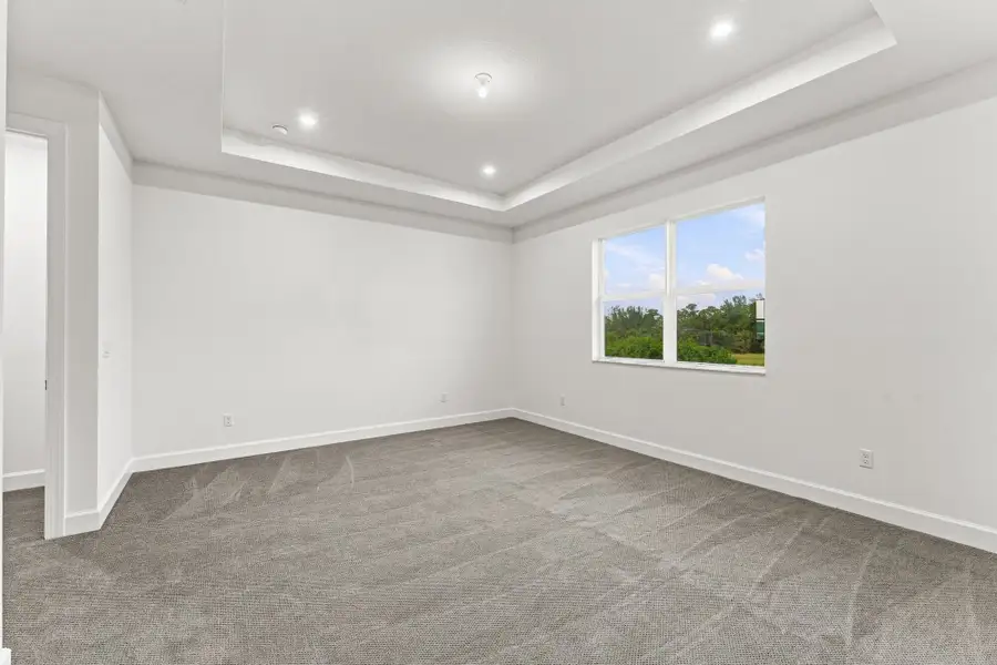 Spacious, unfurnished interior of a new home in Tradition, Port St. Lucie (Image 11).
