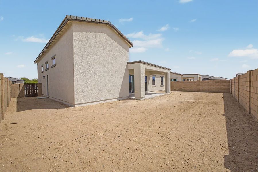 Exterior details and patio area of a home in Valencia at Granite Vista, Waddell (Image 21).