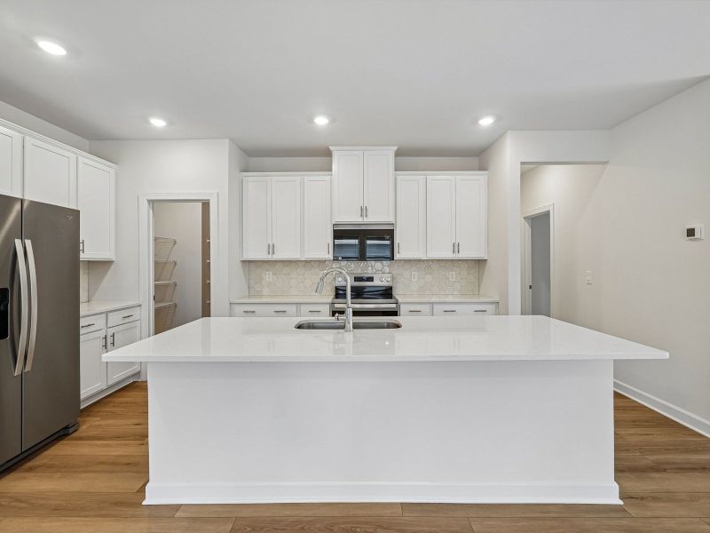 Furnished interior view inside a new home in Walnut Reserve, Conover (Image 3).