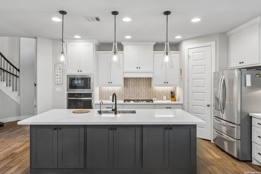 Furnished interior view inside a new home in 6 Creeks, Kyle (Image 11).