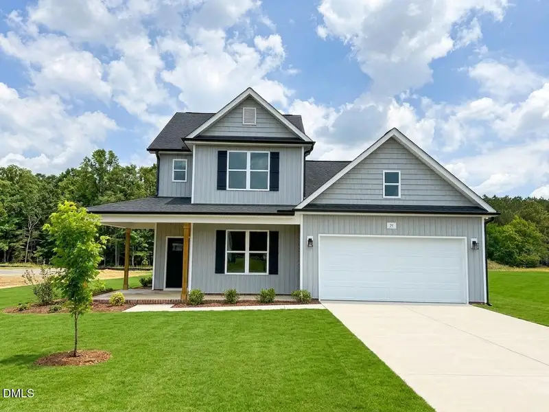 Front exterior of a new home in Maggie Way, Wendell, NC, highlighting curb appeal (Image 1). Front exterior of a new home in Maggie Way, Wendell, NC, highlighting curb appeal (Image 1).
