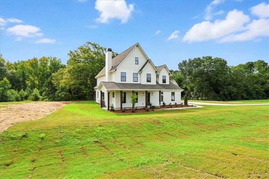 Front exterior of a new home in Old Town Estates, Monroe, GA, highlighting curb appeal (Image 28).